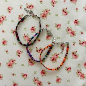 three bohemian patterned bracelets